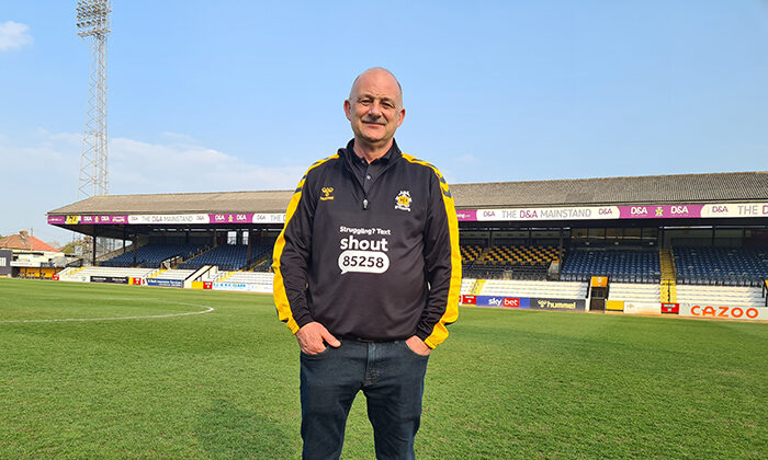 Ian Darler, Head Groundsman of FC Cambridge United on the pitch