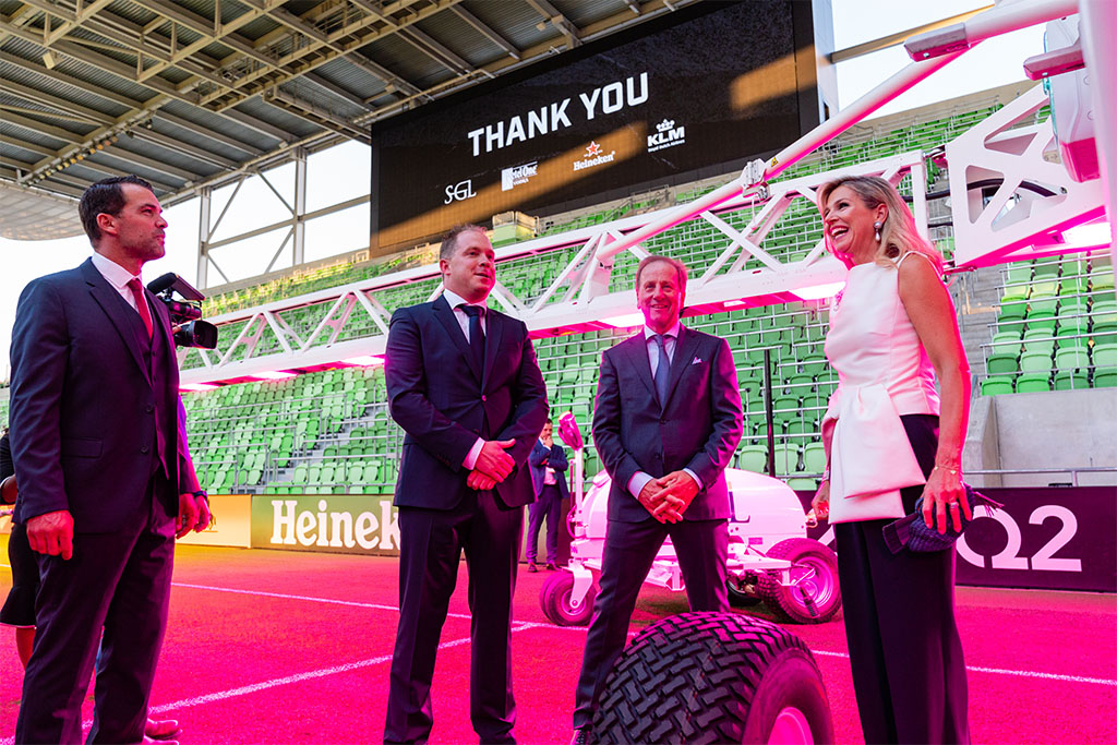 Nico van Vuuren, Frank van Beusekom and Weston Appelfeller, together with Dutch Queen Maxima on the pitch of the Q2 Stadium in Austin, Texas.